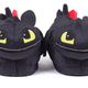 Illustration for article titled Win a pair of Toothless slippers courtesy of season 2 of Netflix’s Dragons: Race To The Edge